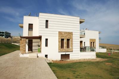 Недвижимость на Пригороды г.Салоники . Таунхаус площадью 280 кв.м.